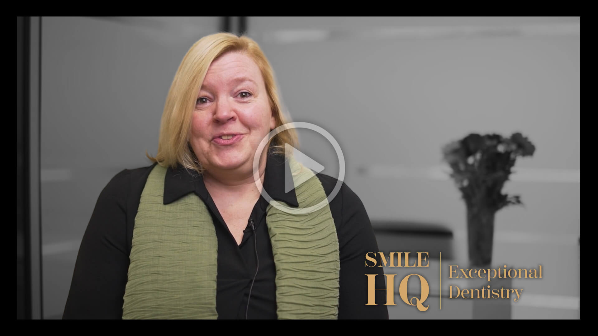 Image of a smiling patient sharing their experience in an interview at Smile HQ