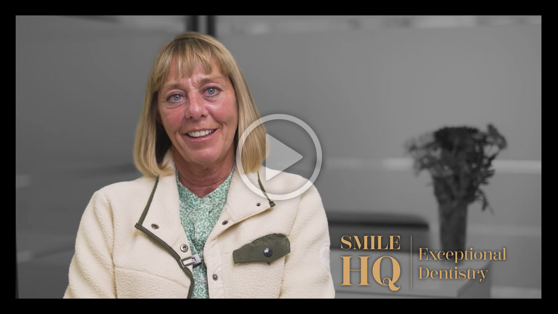 Patient smiling and speaking in a video testimonial for Smile HQ.