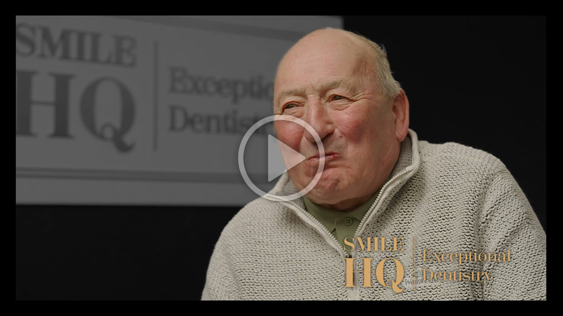 Image of a patient smiling during an interview at Smile HQ