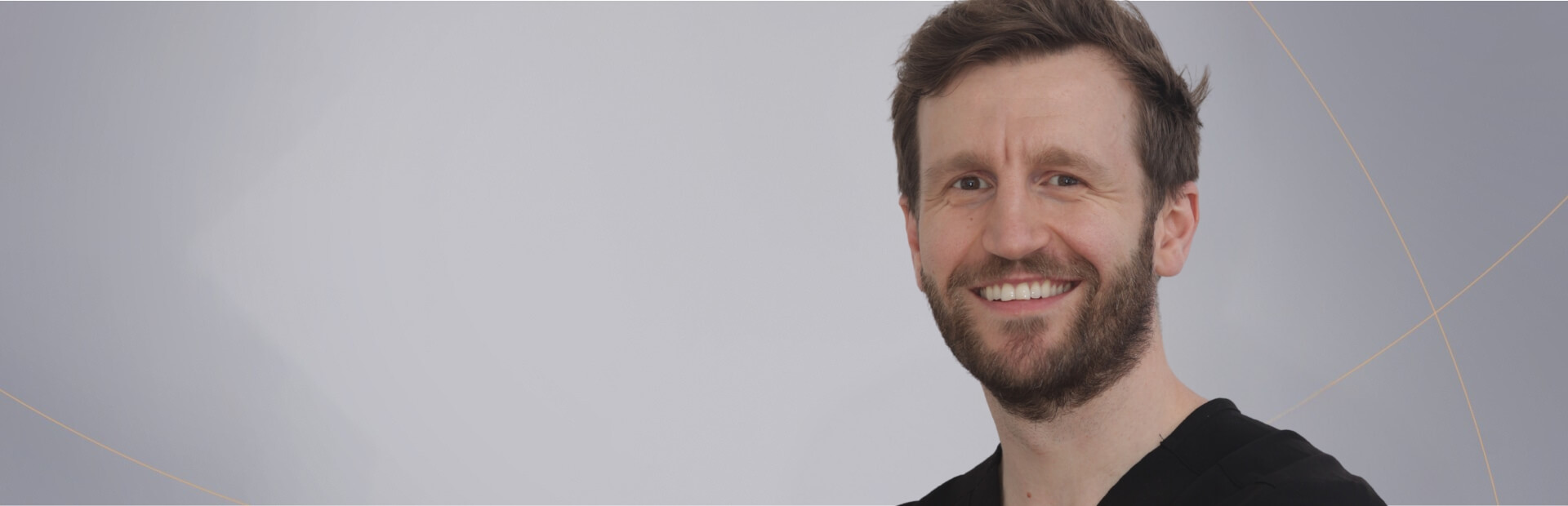 Portrait of a smiling dentist, ideal for a promotional banner for Smile HQ Exceptional Dentistry.
